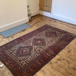 Persian patterned rug , three lozenge medallions on a pole , pale ground , broad border , 217 cm x 128 cm