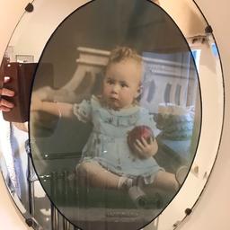 Unusual antique  hand painted Picture Of A Baby in a original mirror frame. 
This is a very unusual mirrored frame in original condition, with hanging chain.

Viewing welcome