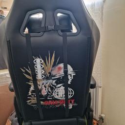 Gaming chair colour green and black. Detachable head and lumber. The chair has been used a couple of times. Is very good condition, no scratches or damaged.