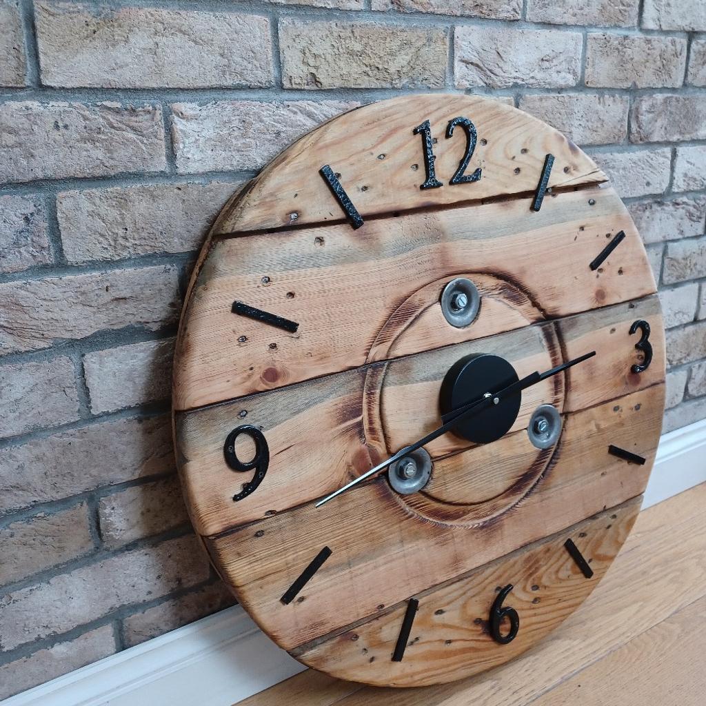 Large Rustic Reclaimed Cable Drum Clock .The wood has been sanded, slightly scorched and oiled to bring out the natural wood grain. New Clock mechanisms added.
Diameter- just under 70 cm
Thickness of wood – 4 cm
This item is very heavy and will require fixing onto a suitable supportive wall.
Please note : All my wood pieces are from recycled, refurbished wood, it may have some signs of imperfections from their previous use. However, all this adds character, making each piece unique with it’s own quirks.
I hate seeing items go to waste. I love giving them a new lease of life.
Pick up Coven please. X
