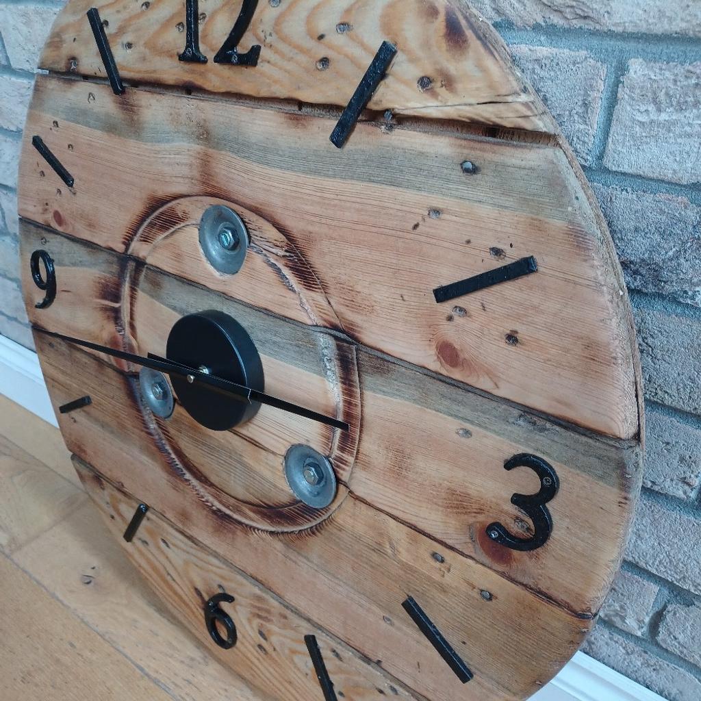 Large Rustic Reclaimed Cable Drum Clock .The wood has been sanded, slightly scorched and oiled to bring out the natural wood grain. New Clock mechanisms added.
Diameter- just under 70 cm
Thickness of wood – 4 cm
This item is very heavy and will require fixing onto a suitable supportive wall.
Please note : All my wood pieces are from recycled, refurbished wood, it may have some signs of imperfections from their previous use. However, all this adds character, making each piece unique with it’s own quirks.
I hate seeing items go to waste. I love giving them a new lease of life.
Pick up Coven please. X