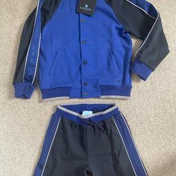 Brand new with tags boys lanvin shorts and jacket set age 6 years

Collection or local delivery