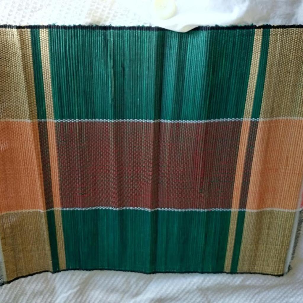 Set of 7 Green & Orange African Handwoven Table Placemats with Runner. Unique from Uganda. Runner measures 82cm wide x 32cm high and 6 x mats 37cm wide x 32cm. Lightweight and rolls to a small package for easy storage. Brand New.