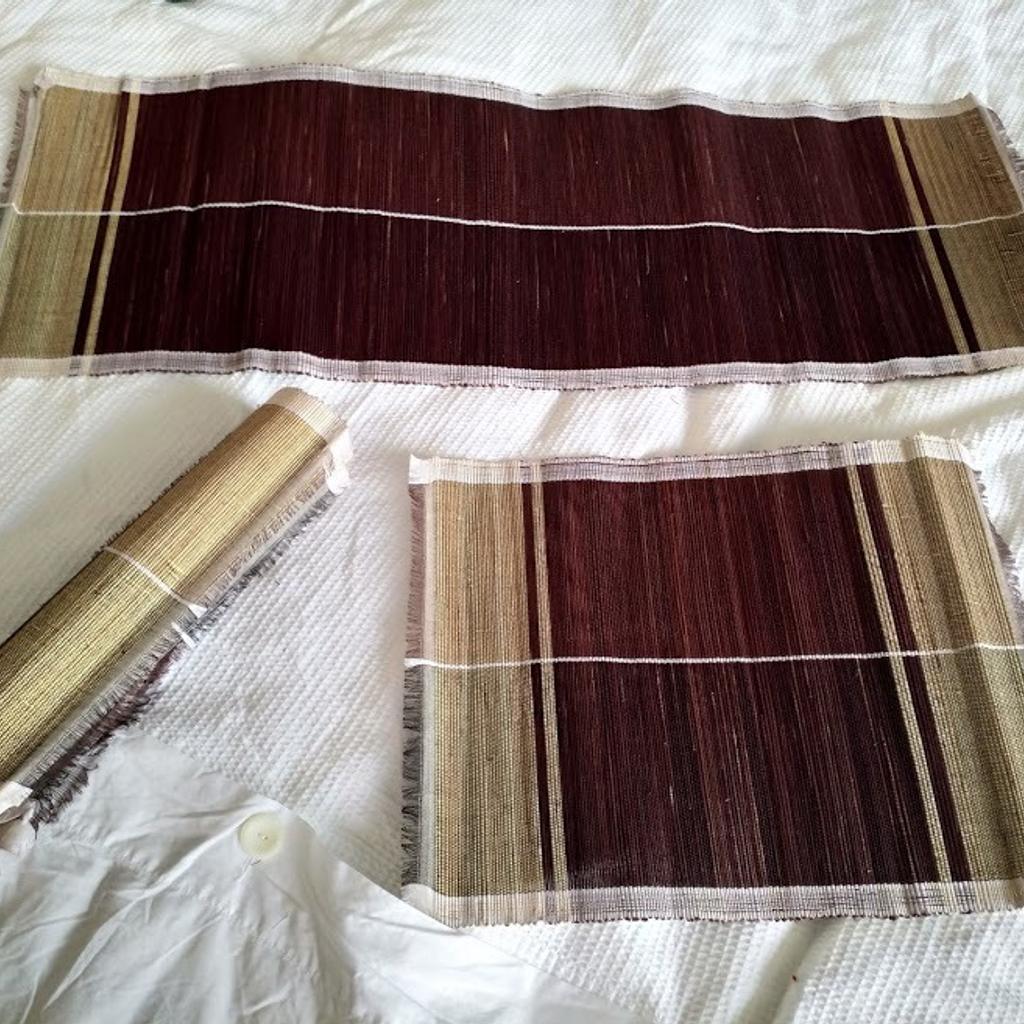Set of 7 Beige & Burgundy African Handwoven Table Placemats with Runner. Unique from Uganda. Runner measures 85cm wide x 32cm high and 6 x mats 40cm wide x 32cm. Lightweight and rolls to a small package for easy storage. Brand New.