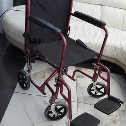 foldable wheelchair 19inched seat width with foot brakes and safety belt.