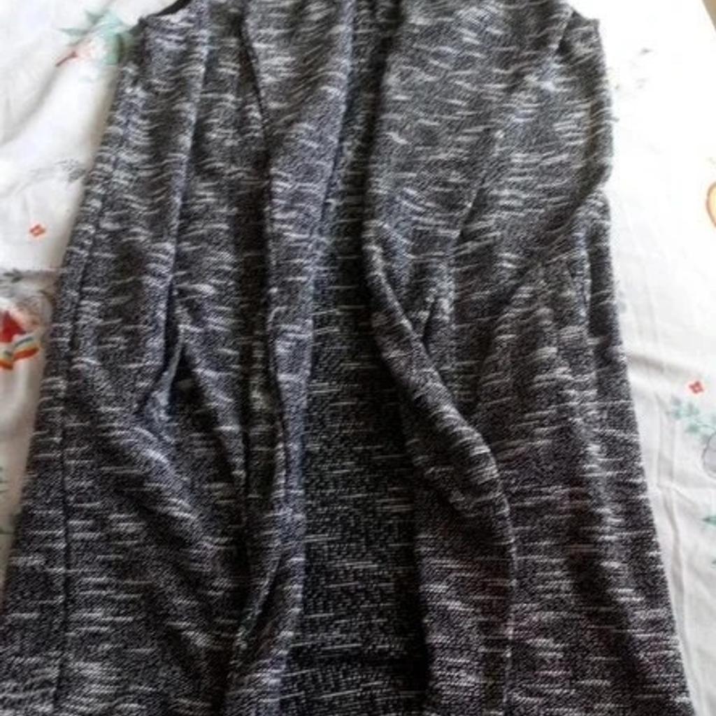 Sleeveless Cardigan, size 14, great for summer or winter, great as a Christmas or birthday gift, or treat yourself.