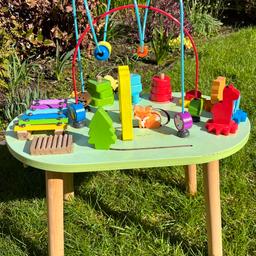 Outdoor Activity table with all pieces still together. Moving objects and beads for hand eye coordination development. Also has musical instruments. This is in fair condition, will need a wipe over.

This is made of wood and has legs which can be unscrewed for easy transportation. 