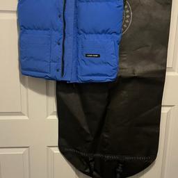 Medium Man's Canada Goose Gilet in good condition but does have slight wear to bottom as shown in picture although when Gillet is worn this cannot be seen Will have it dry cleaned before sale. Collection only