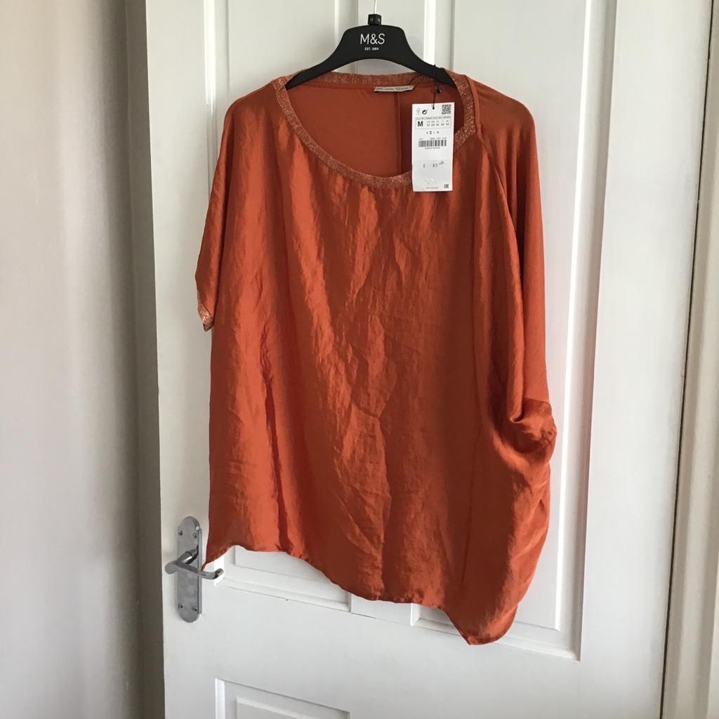 Ladies BNWT orange top from Zara
Size medium
Pet and smoke free home