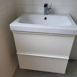 White IKEA Bathroom sink and hanging unit. Two large drawers - see dimensions on last picture.

Good condition and includes all wall fixings and waste and flexible pipes however it will need a new tap

The drawers are white high gloss.. Some signs of wear and tear but nothing that takes away from the unit. 

Cost£300 new