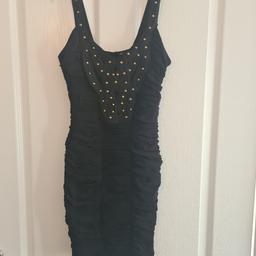 Jane Norman Womens Black Ruched Dress with Gold stud detail.

Super Stretchy material. Label says size 12 but Jane Norman is known to come up small. More a small size 10 or 8-10.

Brand New label still on. RRP £45.

Collect from NG4 or weekdays daytime from NG1 Notts City Centre. Can Post for additional £3.