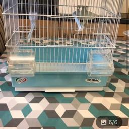 Bird cage. Brand new. Comes with feeders, perches , toys and pull out tray for easy cleaning.see last picture for cage measurements.