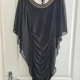 Jane Norman Black Detailed Neck Dress with Mesh Wings size 12.

Only worn once. Excellent condition & quality.

Collect from NG4 Area or weekdays daytime from NG1 Notts city centre. Can post for additional £3 postage.