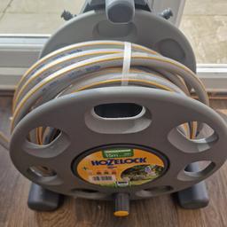 brand new 15m on the reel thing
not sure where the connections are so there not included just the hosepipe and holder