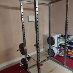 mirafit M100
squat rack
can do squat and bench press
safety bar and pins
dips bars included
can take 200kg at least