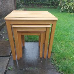 pine coloured nest of 3 tables in good condition solid made. large table 52cm by 43cm by 56cm high. small table 30cm by 33cm by 40cm high .Good sized useful tables. COLLECTION ONLY PLEASE.