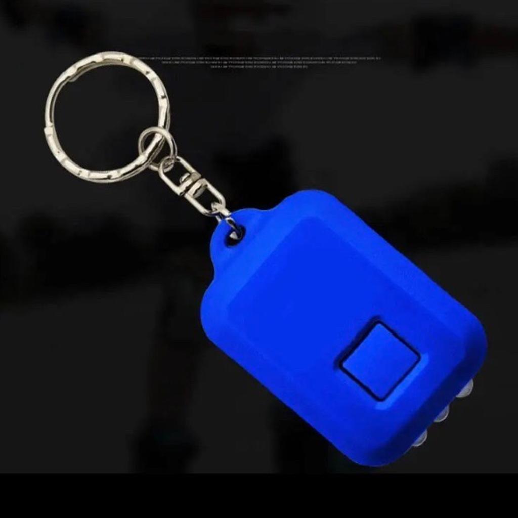 Schlüsselanhänger-Taschenlampe mit 3 LED, Wiederaufladbar durch Integriertes Solar-Modul, in den Farben rot oder blau, Preis pro Stück