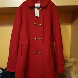 really nice warm coat made for a 15 year old but could fit others really good quality from next brand new with tags never been worn and embellished buttons to bring the mood