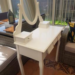 dressing table comes with the mirror attached.
width  32 inches
depth  16 inches
length 30 inches
bottom 3 drawers do not have the drawer runners or drawer knobs. I put it together before I realised they were missing. stool is listed separately.