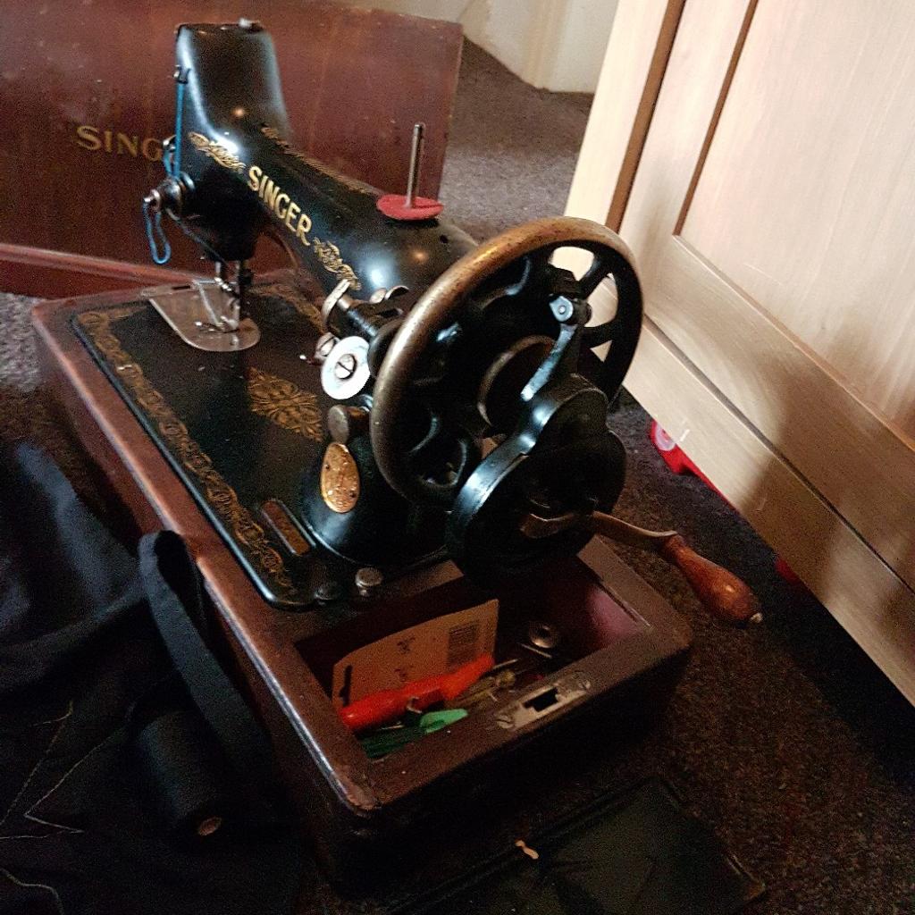 antique hand machine,it good working order,with lid and accessories