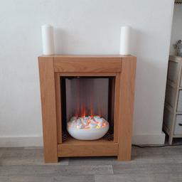 Electric fire suite, Adam Monet in oak surround with white pebble fire pit and beautiful soft orange glow.. Has 2 settings 1kw to 2 kw. Is 2ft wide by 2 and 1/2ft high. As new, only used twice. can be seen in Argos £240 new. easily transported. Maybe able to deliver in Leeds area. A bargain at £80. reduced.