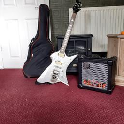 retro guitar and Roland amp used a couple of times plus extras. May swop  for good metal detector.