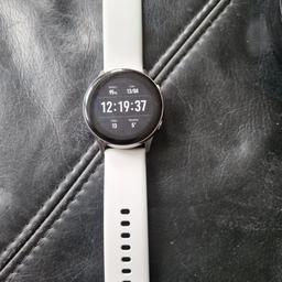 Samsung galaxy active smart watch. perfect condition only selling due to upgrade. fully working order. comes with charger, box and extra long strap never been used. offers welcome.
