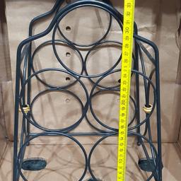 wrought iron bottle rack
great condition see images for details. combined post available.