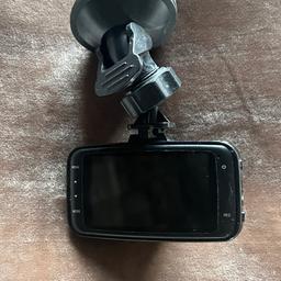 This is a dash  cam (Resolution 1080 FHD) that has a sucker that sticks to your windscreen and is powered by a 12v cigarette lighter socket. You will need to buy a 32gb Micro SD (TF) to record on to, you can get them for £5 on ebay
