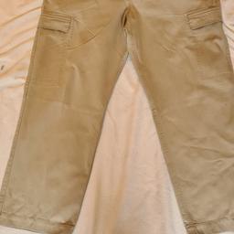 Men's Marks And Spencer Heavy Cargo trousers Size 35w 29l. Adjustable waist. Fantastic condition. First to see will buy. Outstanding quality garment. See photos for condition, flaws, size and materials. I can offer try before you buy option but if viewing on an auction site viewing STRICTLY prior to end of auction.  If you bid and win it's yours. Cash on collection or post at extra cost which is £4.55 Royal Mail 2nd class. I can offer free local delivery within five miles of my postcode which is LS104NF. Listed on five other sites so it may end abruptly. Don't be disappointed. Any questions please ask and I will answer asap.