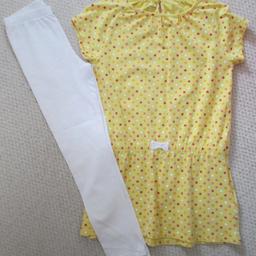Vertbaudet outfit.  Yellow tunic style top with mixed colour spots over, elasticated waist with mock bow (worn only a couple of times).  White leggings to complete outfit (these are brand new and unworn).  Age 8 years.  Immaculate condition.