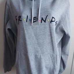 H&M grey 'Friends' hoodie.  Excellent condition as limited wear.  Size Small.