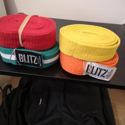 Four Karate Uniform bflts in Orange, Green, Red, and Yellow colors. Each belt is £5.00