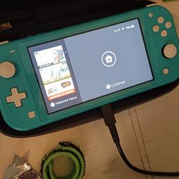 hi selling Nintendo switch lite in fabulous condition comes with original charger and a carry case