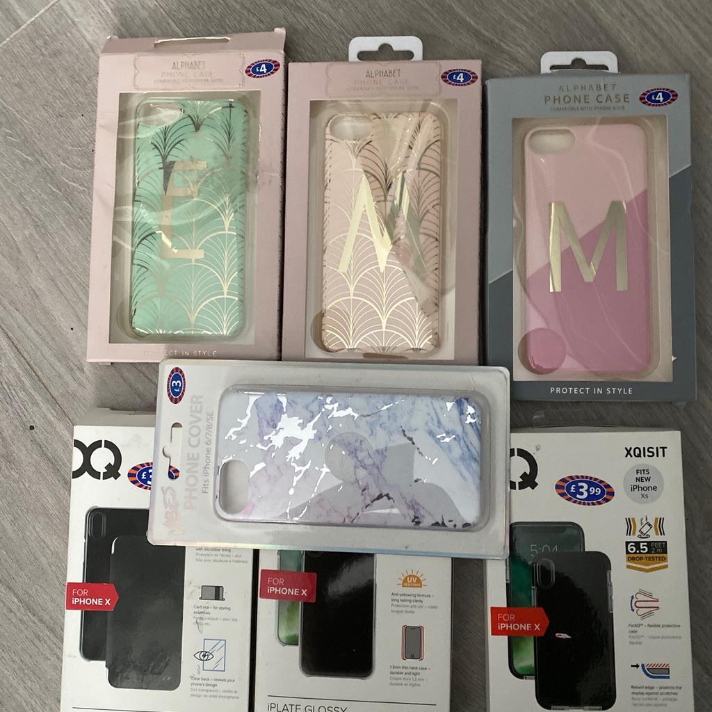 New still in boxes never been used phone cases