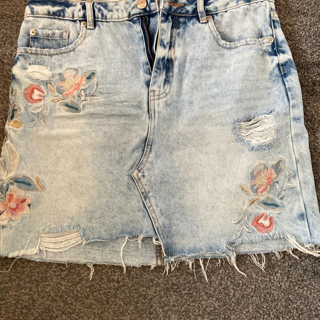Ladies skirt denim with flower embroidery worn once size 12