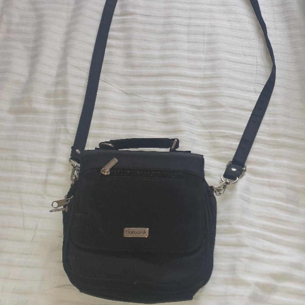 Brand new Burcardi pouch. Its got 7 different compartments. it has 3 cards department and its got small mirror too. from smoke and pets free home. very good condition. local delivery available with small amount of charge.