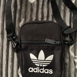 Man bag good condition black adidas only been used once or twice