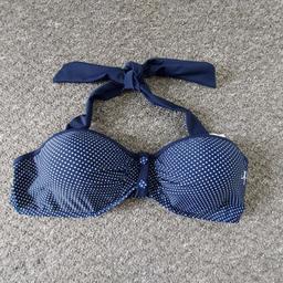 Swimwear Bra "Op"OP Halter Bikini Underwired

Navy Polka Dot Colour

New With Tags

Actual size: cm

Breast volume: 76 cm – 80 cm

Depth bust: 13.5 cm

Size: 14 (L)

Body: 82 % Nylon
 18 % Elastane

Lining: 100 % Polyester

Made in China

Retail Price £ 17.99
