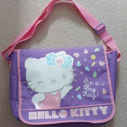 Hello Kitty messenger bag.  Adjustable strap.  Loads of room. Excellent condition (like new).