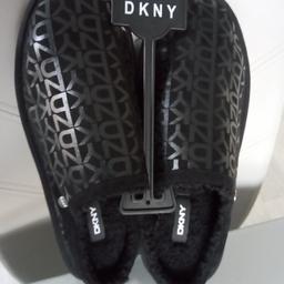 DKNY ladies black sliders size 7.
Brand new.Unwanted Xmas present from TKMax.