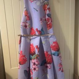 Beautiful girls Ted Baker dress in stunning lilac colour with floral design and back detail.

Only used once as good as new

Perfect for parties, weddings, christenings, Christmas etc

Age 13yrs

Collection only OL12