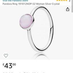 Pink birthstone ring
Size 52