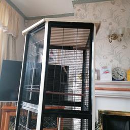 Large bird cage used to have finches but suitable for most birds comes with dishes and perches cost 150 pounds 9 months ago sell for 70 pounds no offers. It's been dispatched and cleaned for easy transport can be put back together if it fits in your car it as casters to move