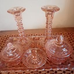 Beautiful vintage glass dressing table set comprising of bevelled edge tray, two candle holders, a ring holder and two trinket pots with lids. In good used condition. Collection only from Stourbridge. Delivery /postage not available. Very reasonably priced.