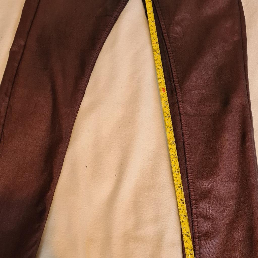 High Waist Sz 12 Burgundy Very Strechy Shiny Select Jeans. See photos for condition, flaws, size and materials. I can offer try before you buy option but if viewing on an auction site viewing STRICTLY prior to end of auction.  If you bid and win it's yours. Cash on collection or post at extra cost which is £4.55 Royal Mail 2nd class. I can offer free local delivery within five miles of my postcode which is LS104NF. Listed on five other sites so it may end abruptly. Don't be disappointed. Any questions please ask and I will answer asap.