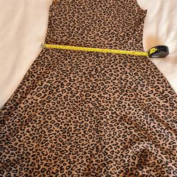 Top Shop Ladies Size 10 Leopard Print Dress. Great Looking Garment Excellent condition. See photos for condition, flaws, size and materials. I can offer try before you buy option but if viewing on an auction site viewing STRICTLY prior to end of auction.  If you bid and win it's yours. Cash on collection or post at extra cost which is £2.85 Royal Mail 2nd class. I can offer free local delivery within five miles of my postcode which is LS104NF. Listed on five other sites so it may end abruptly. Don't be disappointed. Any questions please ask and I will answer asap.