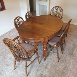 Vintage oak extendable dining table and six chairs.
Table unwinds to allow the fitting of an extending leaf.
Chairs have thin cushions for comfort, two are carvers.
Table and chairs good and solid, their condition is very good for their age but do have occasional small marks as with vintage furniture.
Table Length 59" short 83" extended
Width 42"
Height 29"
Cash on collection please.