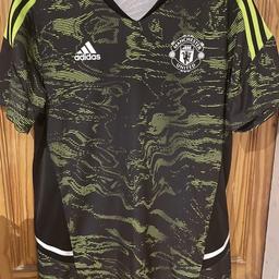 Mens brand new without tags- Manchester United European training football shirt, size large, bought from the Manchester United store for £43 -(too late to send back after wrong size purchased)