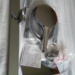 Rainfiniy 130 3 Jet shower set in chrome and mirror. Head ,hose, mirror rail and mirror shelf for shower gel etc. All New and unused, chrome immaculate, hose and fixings still in sealed bags. It does Not come with the plumbing behind the wall, Collection only